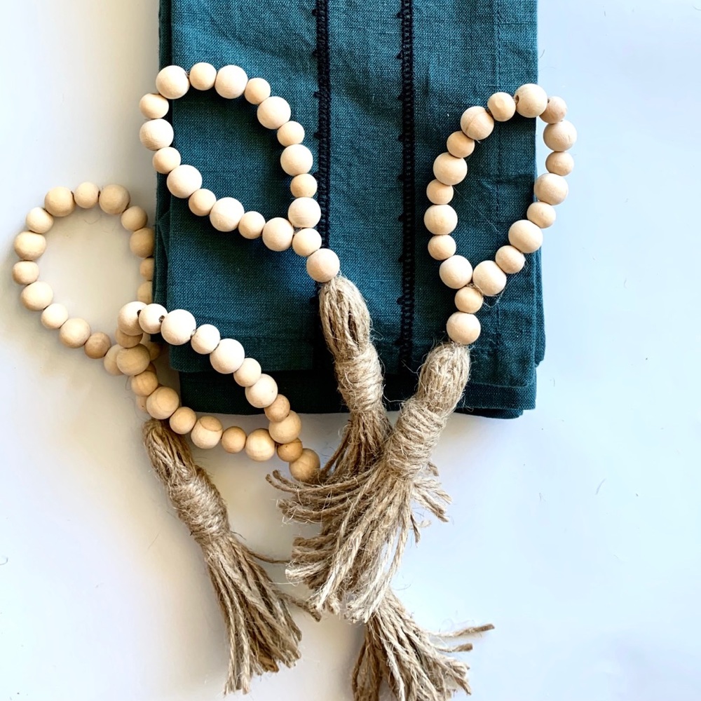 4 Wood bead napkin rings with jute tassel